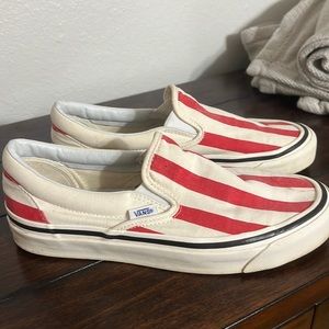Used slip on vans red and cream striped.